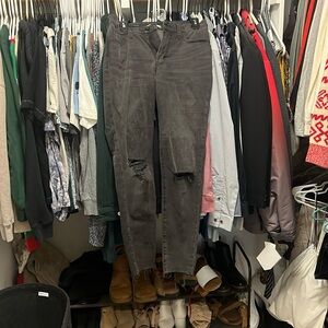 Madewell light black skinny jeans with ripped knees and frayed ankles